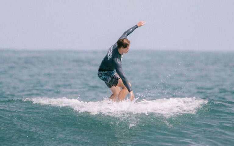 How To Surf: A Step-By-Step Guide for Beginners